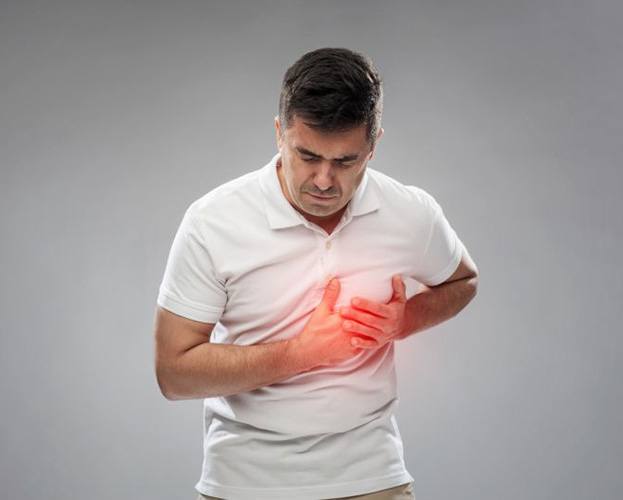 Man in pain, experiencing heart problems