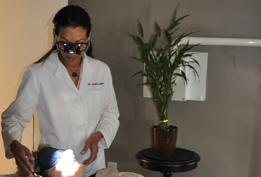 Doctor Castillo providing dental implant tooth replacement