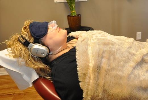 Relaxed patient receiving sedation dentistry