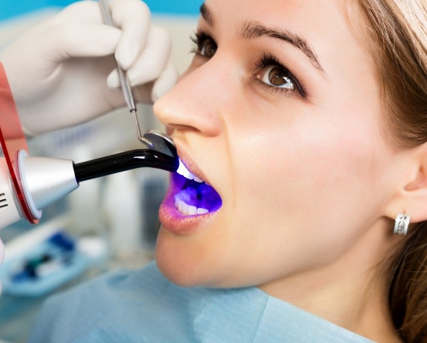 Patient receiving cosmetic dental bonding treatment