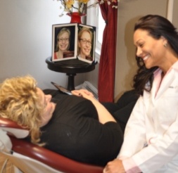 Doctor Castillo talking to patient during dental checkup