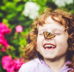 Little girl laughing after children's dentistry visit