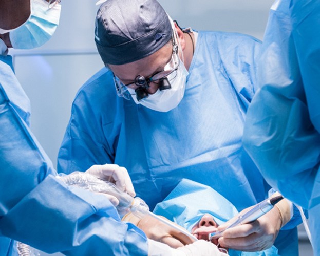 an oral surgeon performing dental implant procedure in North Providence