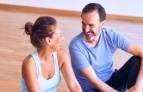 Man and woman smiling after exercising