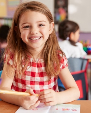 Young girl smile during children's dentistry visit