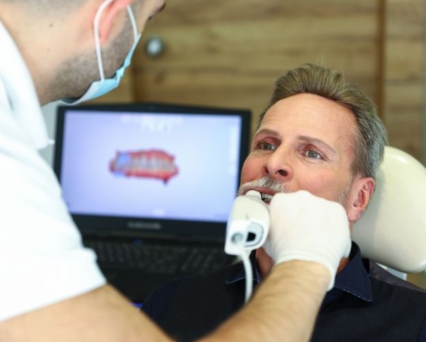 Dentist using digital impression system